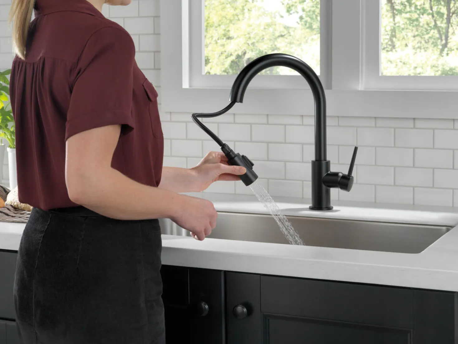 Delta Trinsic Single Handle Limited Swivel Pull-Down Kitchen Faucet