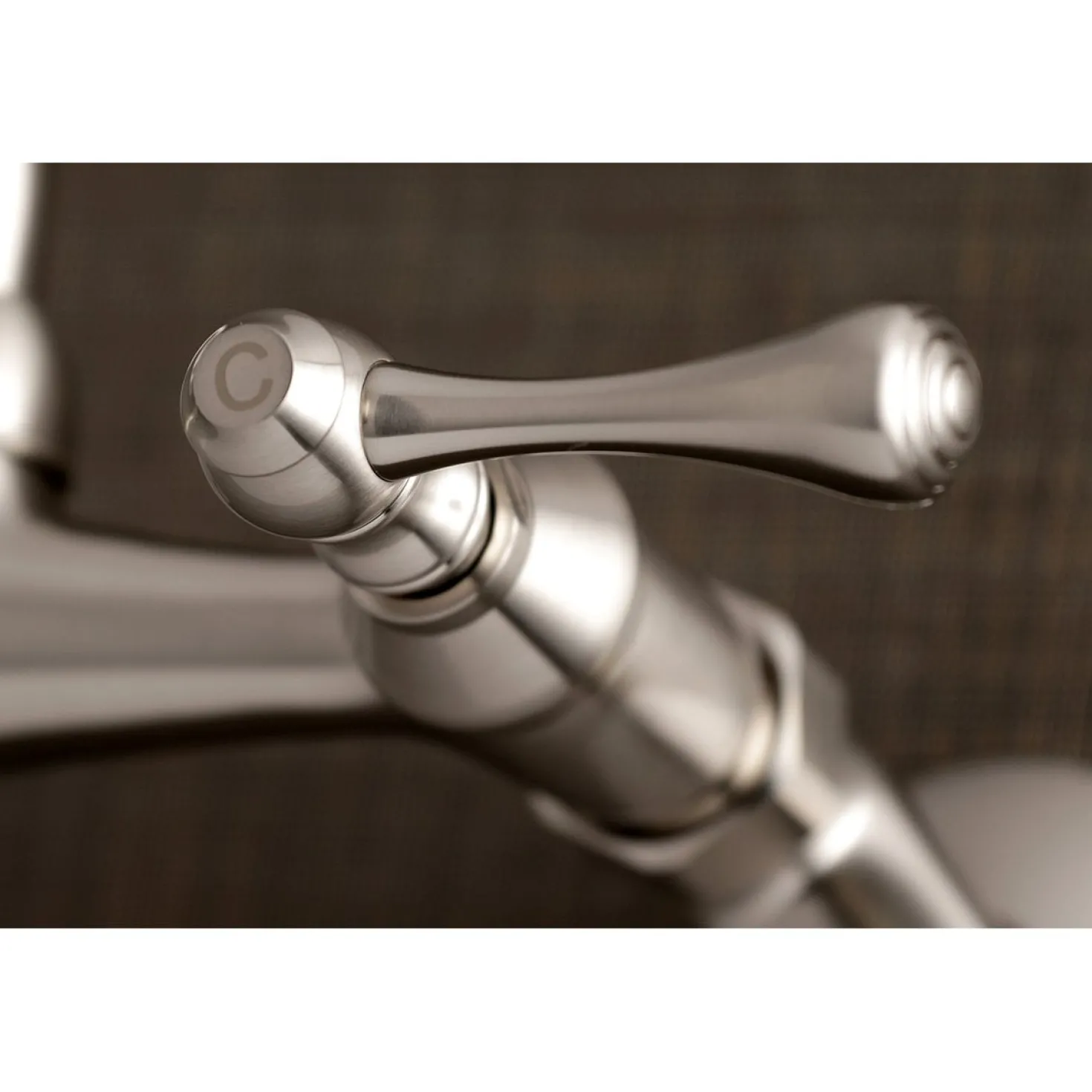 Kingston Brass 6" Adjustable Center Wall Mount Laundry Faucet