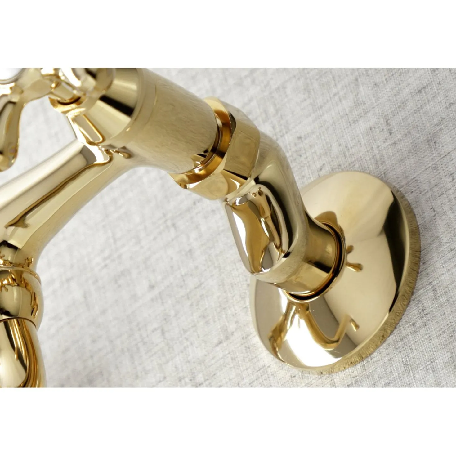 Kingston Brass Adjustable Center Wall Mount Bathroom Faucet