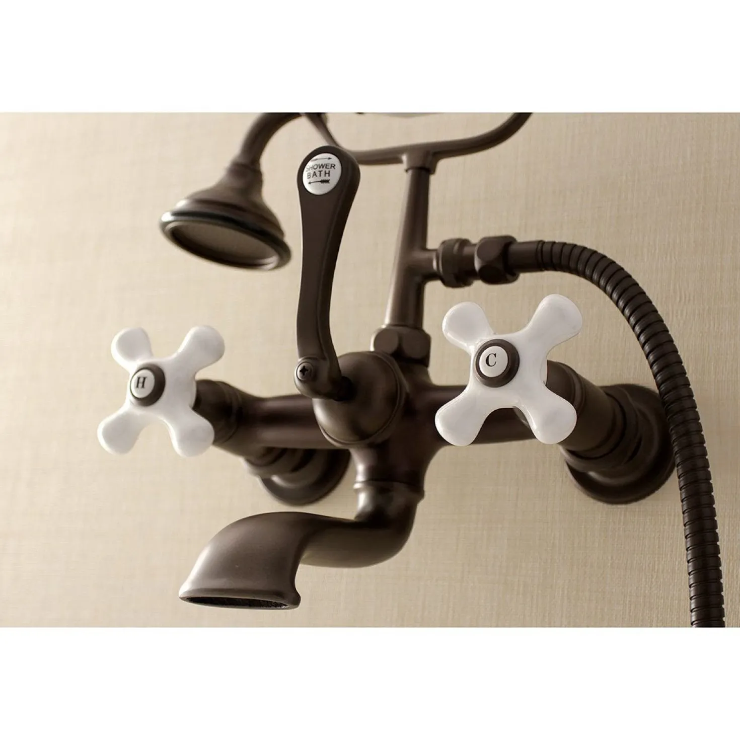 Kingston Brass Aqua Vintage 7-Inch Wall Mount Tub Faucet with Hand Shower