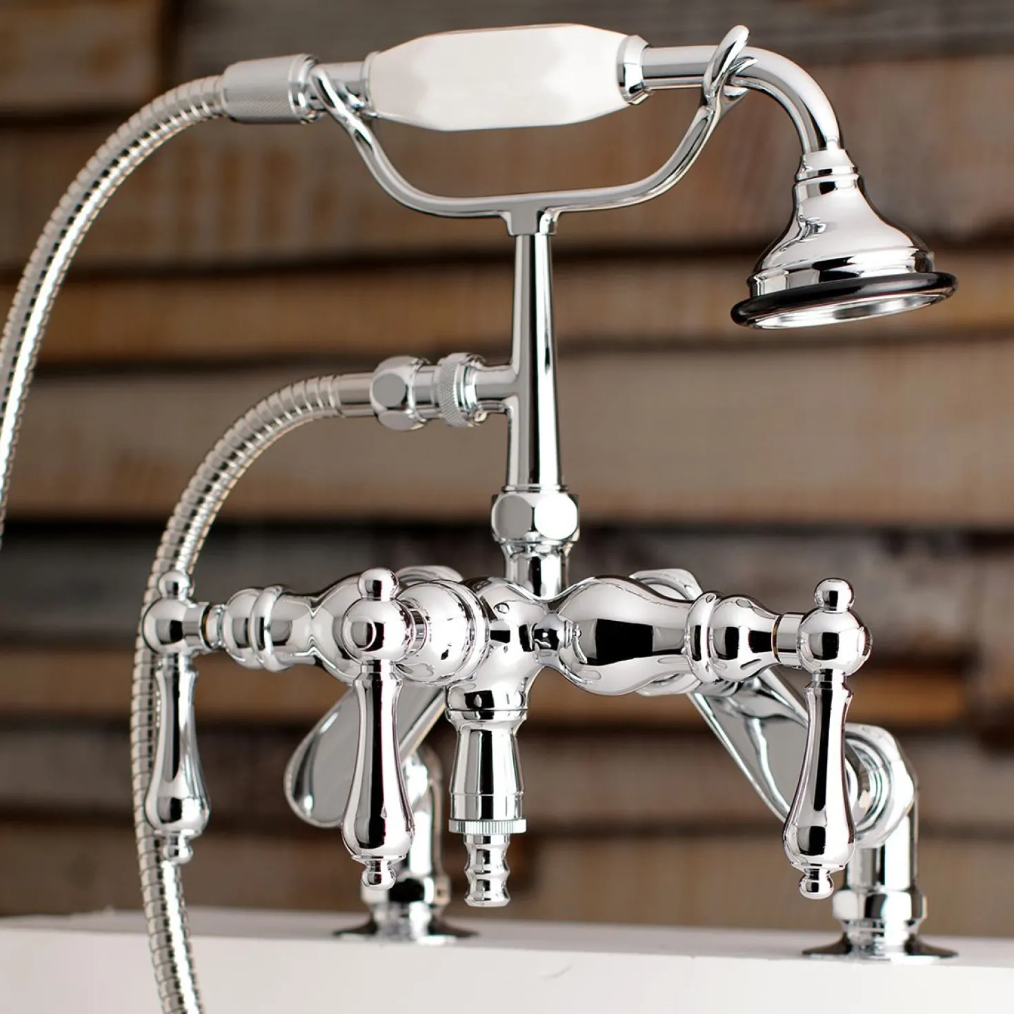 Kingston Brass Aqua Vintage 3-3/8-Inch Adjustable Deck Mount Tub Faucet with Hand Shower in Polished Chrome