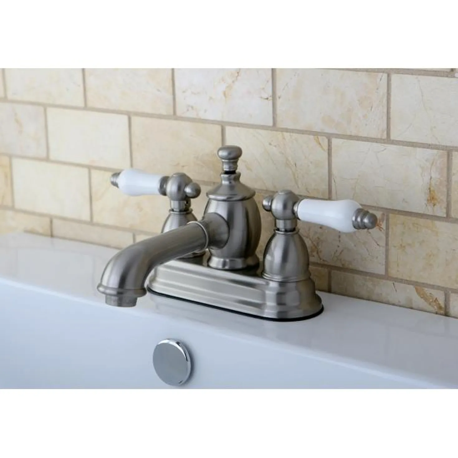 Kingston Brass 4" Centerset Lavatory Faucet with Heritage Spout and Porcelain Lever Handle