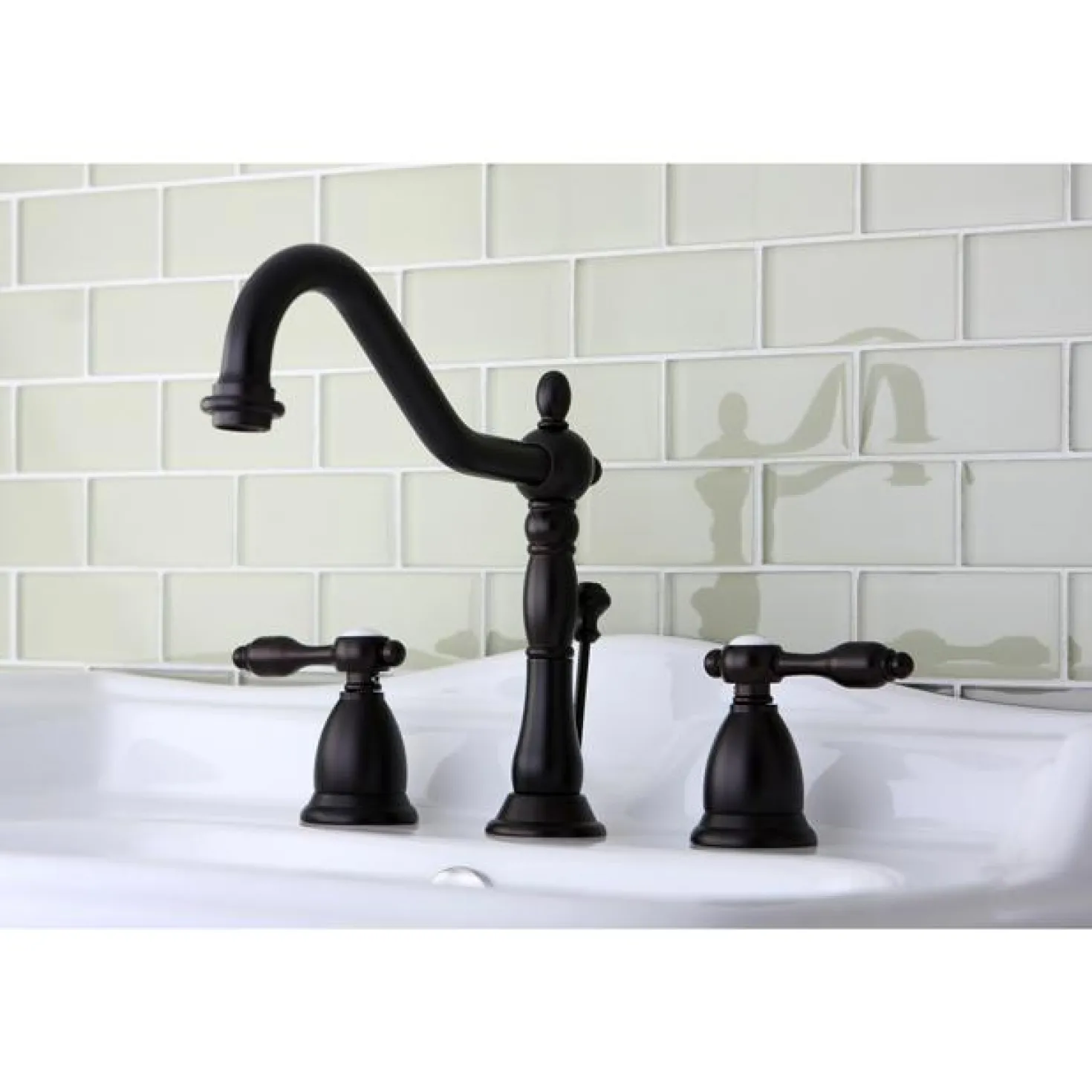 Kingston Brass Classic Tudor Widespread Lavatory Faucet with Brass Pop-up
