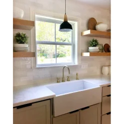 Kingston Brass Concord Deck Mount 8-Inch Widespread Kitchen Faucet with Brass Sprayer