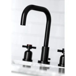 Kingston Brass Concord Deck Mount Widespread Bathroom Faucet with Brass Pop-Up
