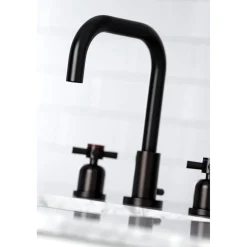 Kingston Brass Concord Deck Mount Widespread Bathroom Faucet with Brass Pop-Up
