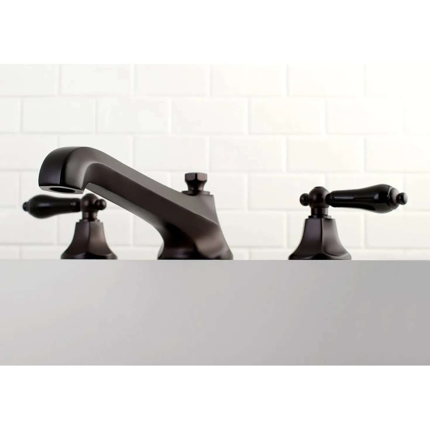 Kingston Brass Duchess Roman Tub Filler with Black Porcelain Lever Handle