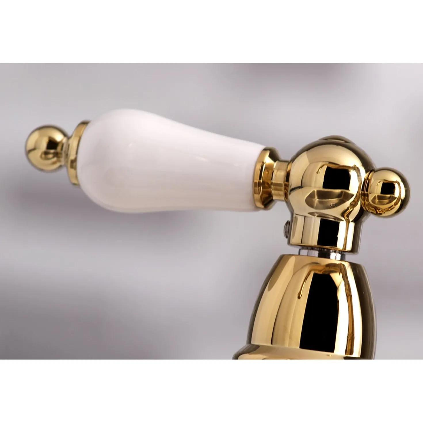 Kingston Brass English Country 4-Hole 8" Bridge Kitchen Faucet with Sprayer