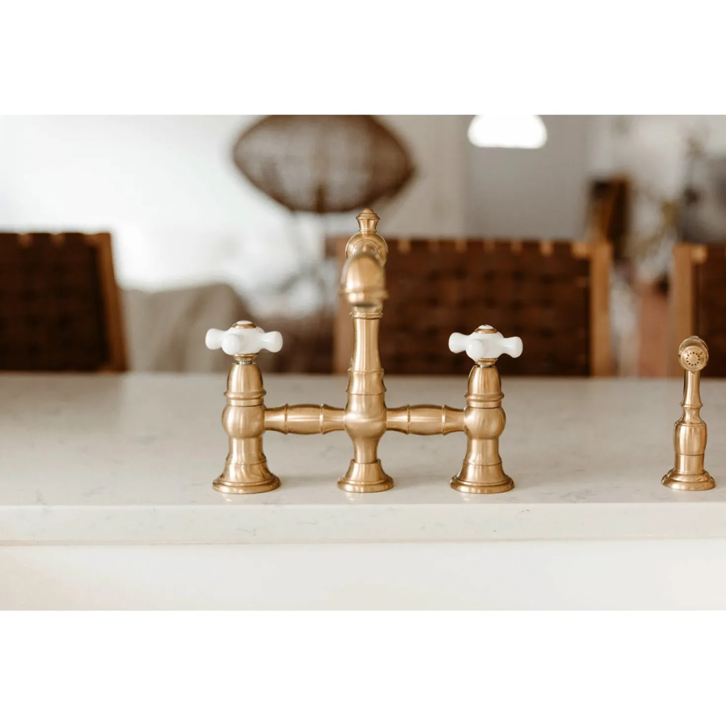 Kingston Brass English Country 8" Bridge 4-Hole Kitchen Faucet with Sprayer
