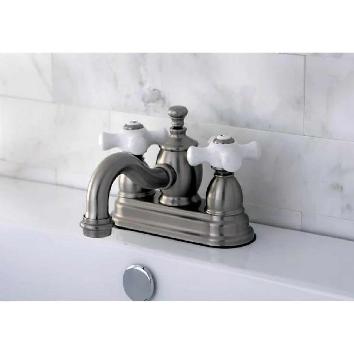 Kingston Brass English Country 4" Centerset Lavatory Faucet with Heritage Spout and Porcelain Cross Handle