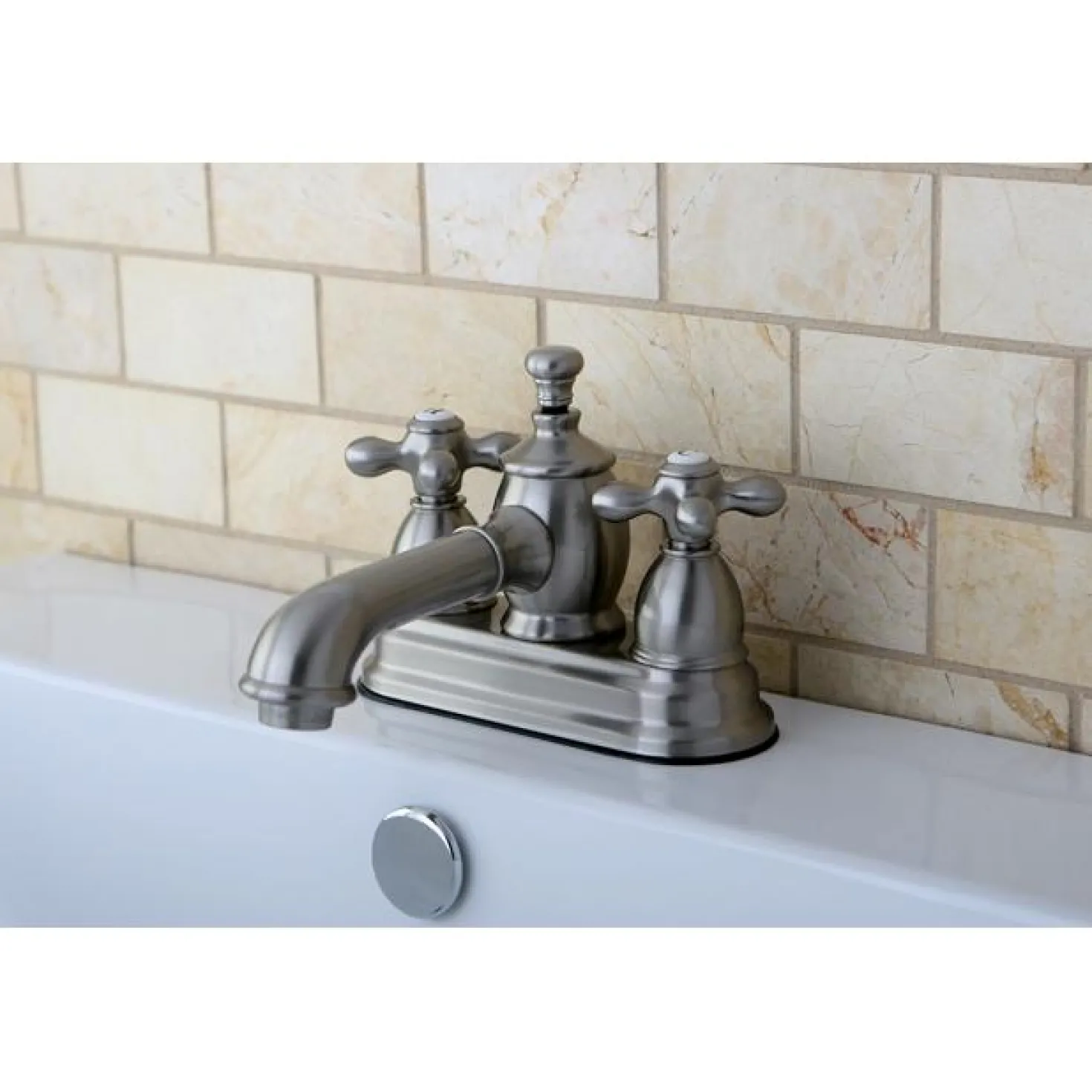 Kingston Brass English Country 4" Centerset Lavatory Faucet with Heritage Spout and Metal Cross Handle