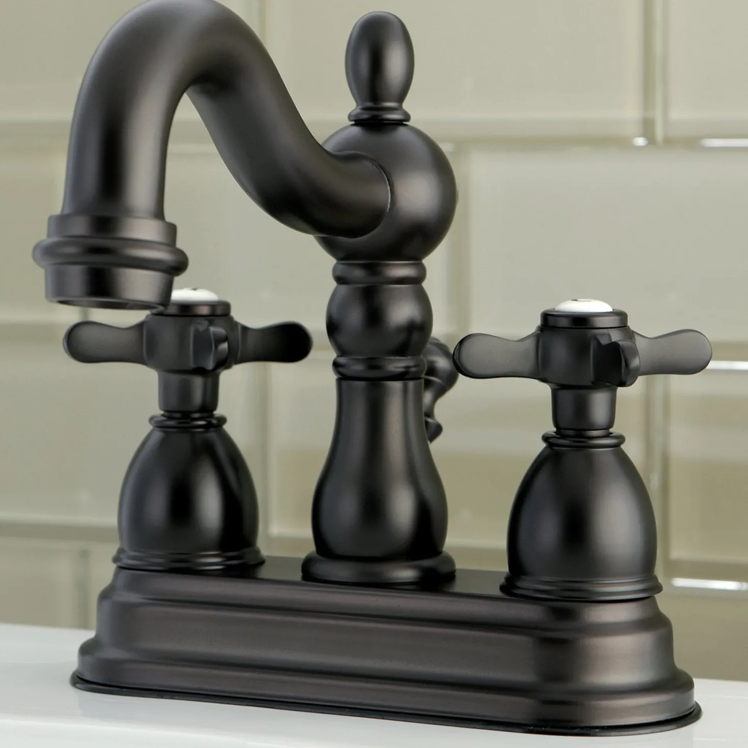 Kingston Brass Essex 4" Centerset Lavatory Faucet with Brass Pop-up