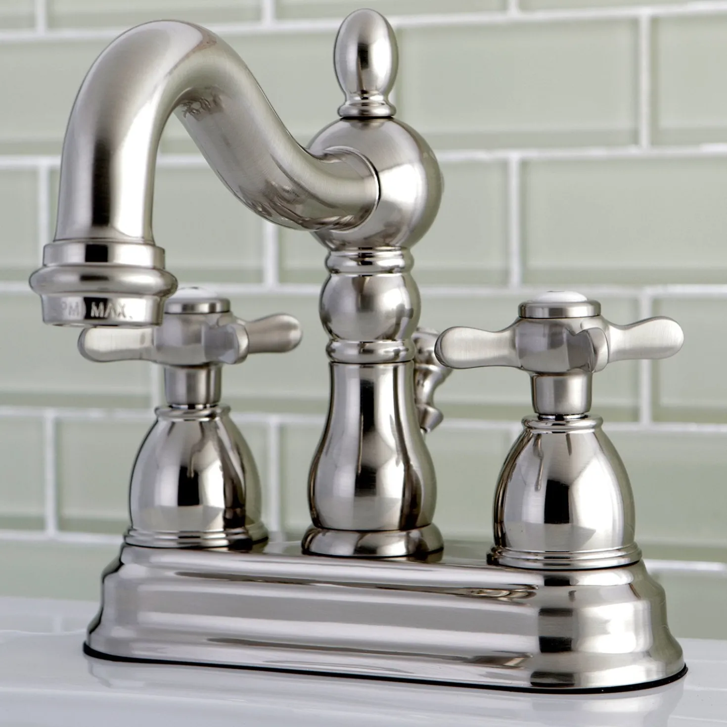 Kingston Brass Essex 4" Centerset Lavatory Faucet with Brass Pop-up