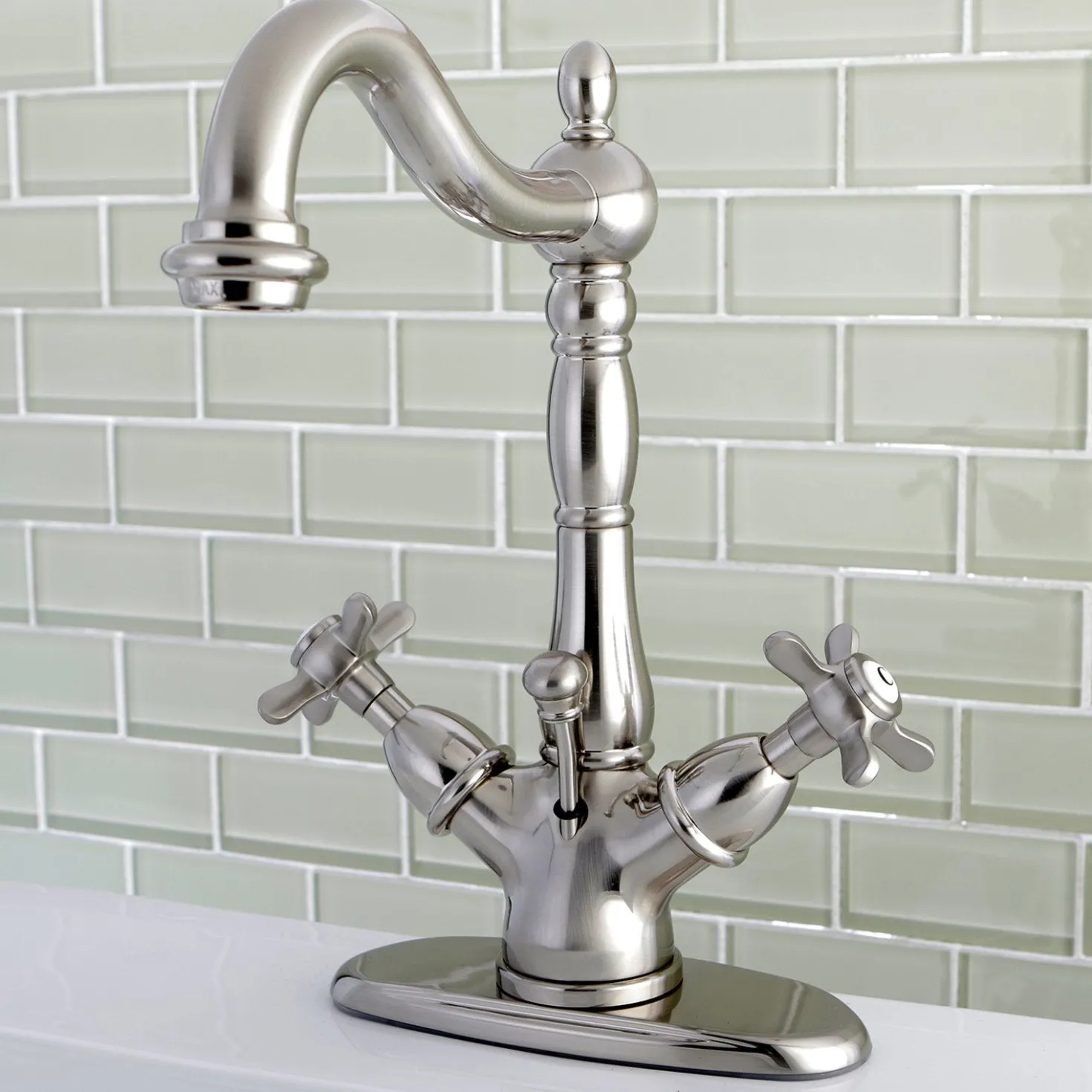 Kingston Brass Essex Classic 4" Centerset Lavatory Faucet with Brass Pop-up