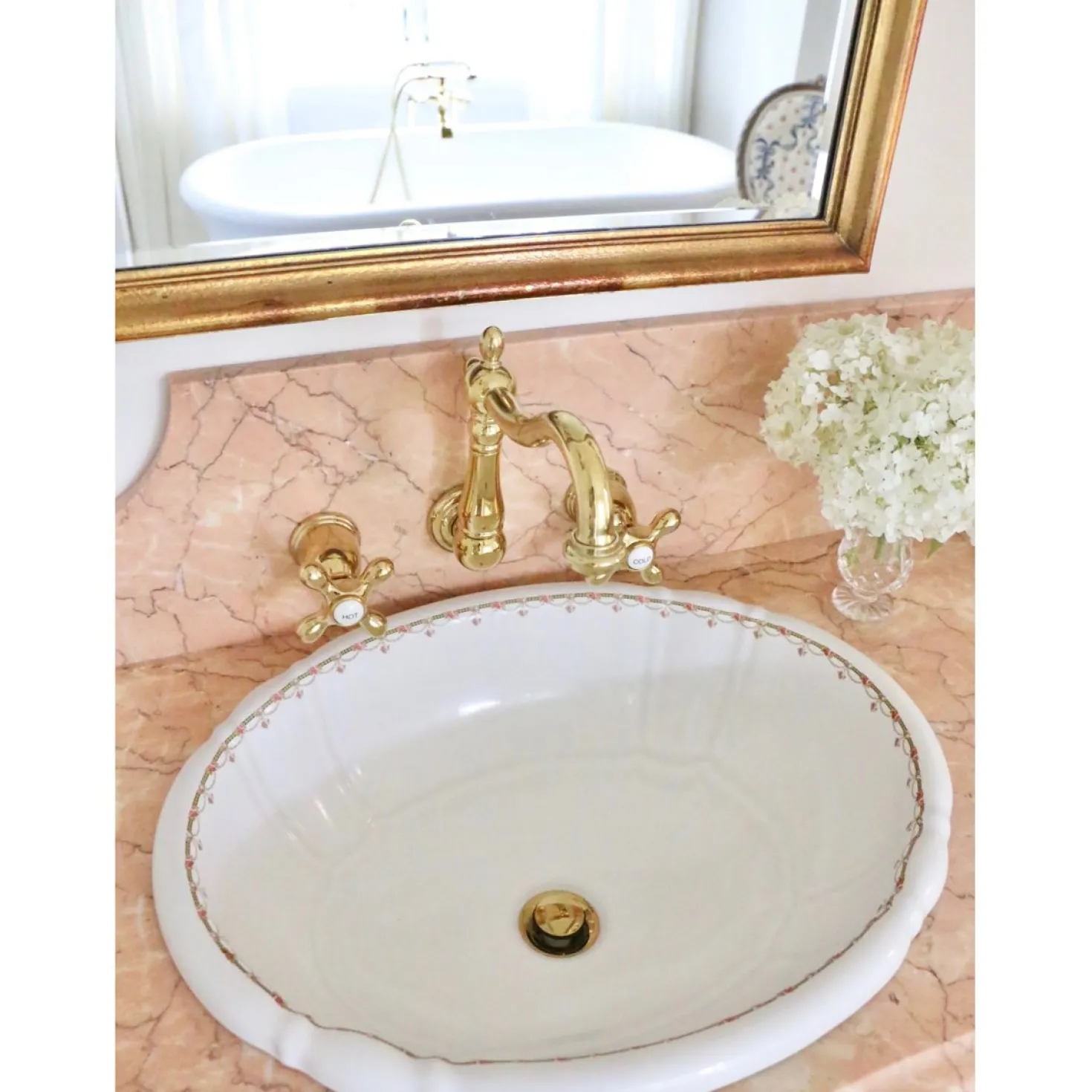Kingston Brass Heritage 8" Center Wall Mount Bathroom Faucet