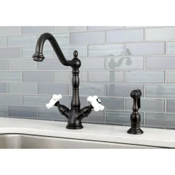 Kingston Brass Heritage Deck Mount 2-Handle Kitchen Faucet with Brass Sprayer and 8-Inch Plate