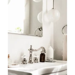 Kingston Brass Heritage Deck Mount 3-Hole 8-Inch Widespread Bathroom Faucet