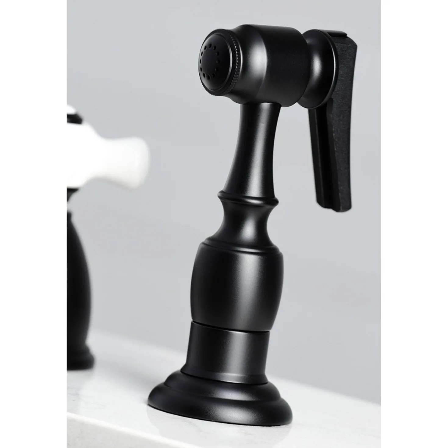Kingston Brass Heritage 4-Hole Widespread Kitchen Faucet with Brass Sprayer