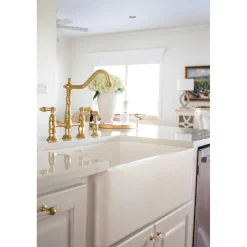 Kingston Brass Heritage 8-Inch Bridge Kitchen Faucet with Brass Sprayer
