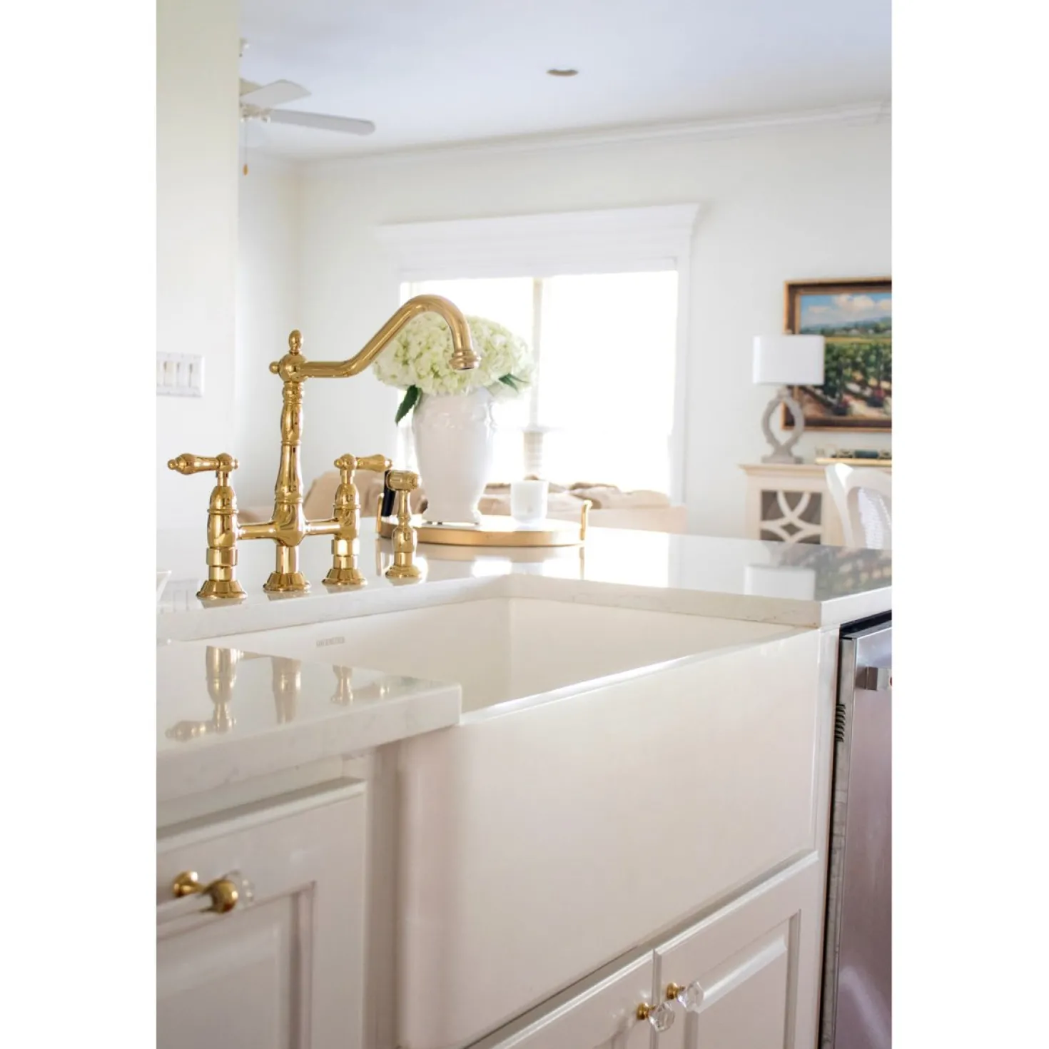 Kingston Brass Heritage 8-Inch Bridge Kitchen Faucet with Brass Sprayer