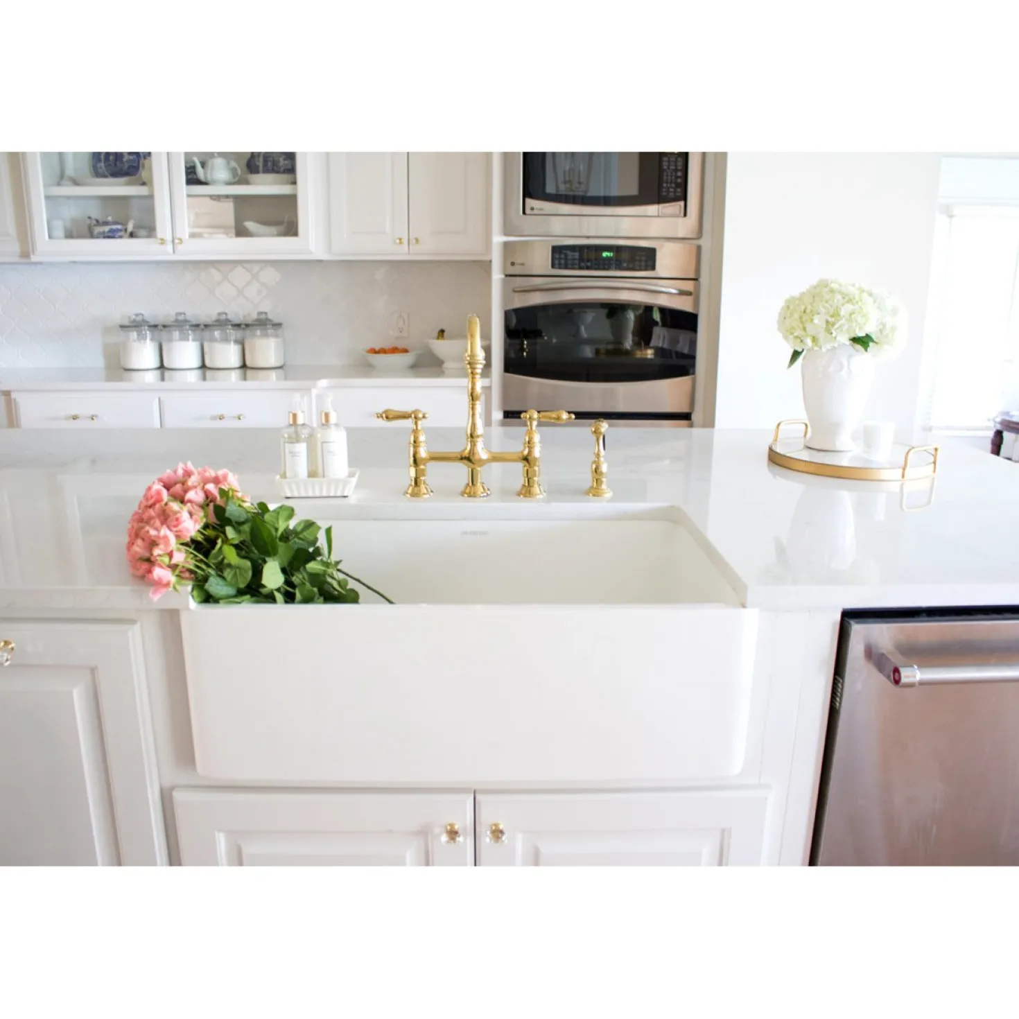 Kingston Brass Heritage 8-Inch Bridge Kitchen Faucet with Brass Sprayer