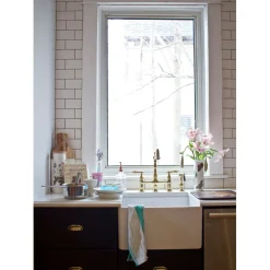 Kingston Brass Heritage 8-Inch Bridge Kitchen Faucet with Brass Sprayer