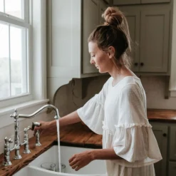 Kingston Brass Heritage 8-Inch Bridge Kitchen Faucet with Brass Sprayer