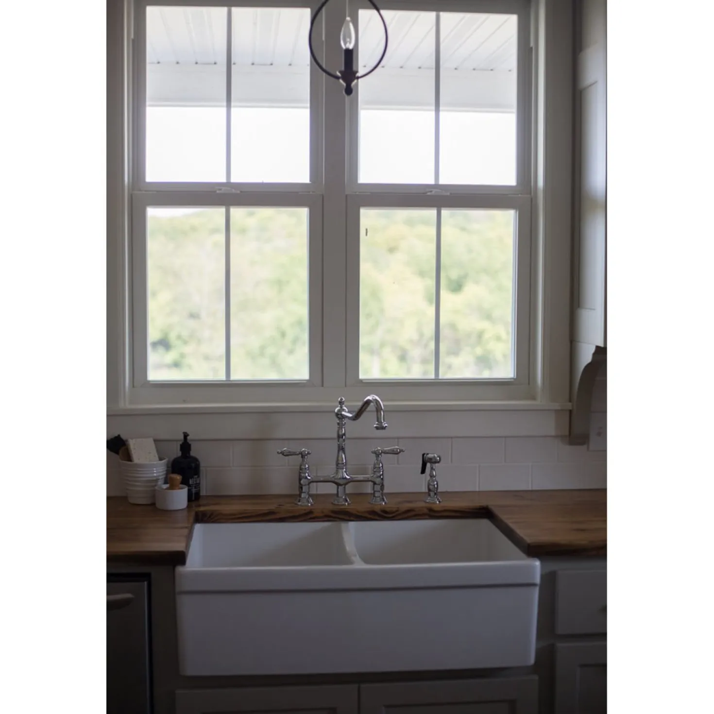 Kingston Brass Heritage 8-Inch Bridge Kitchen Faucet with Brass Sprayer