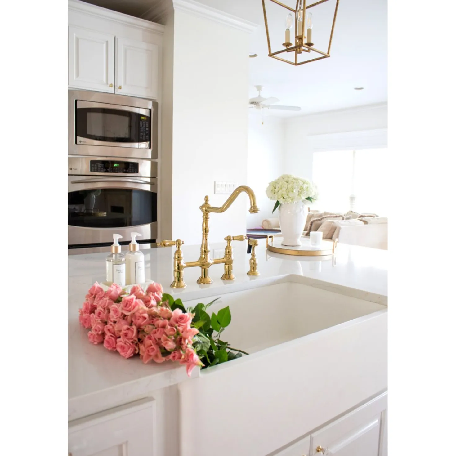 Kingston Brass Heritage 8-Inch Bridge Kitchen Faucet with Brass Sprayer