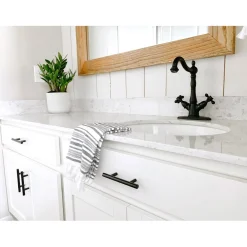 Kingston Brass Heritage 4-Inch Centerset Bathroom Faucet with Pop-Up Drain