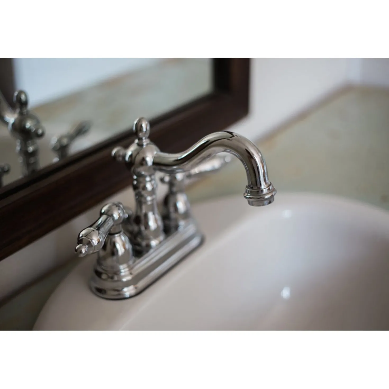 Kingston Brass Heritage 4-Inch Centerset 3-Hole Bathroom Faucet