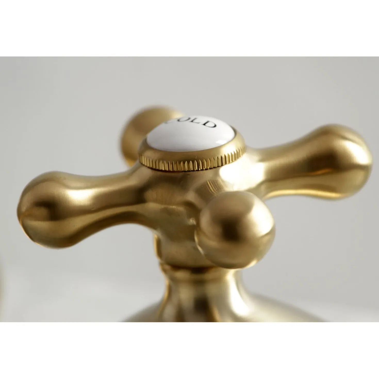 Kingston Brass Heritage 8-Inch Widespread Deck Mount Bathroom Faucet