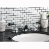 Kingston Brass Heritage Onyx Solid Brass Widespread Lavatory Faucet with Black Porcelain Lever Handle