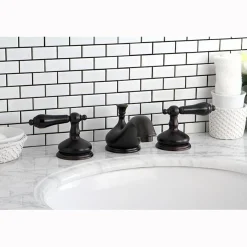 Kingston Brass Heritage Onyx Solid Brass Widespread Lavatory Faucet with Black Porcelain Lever Handle