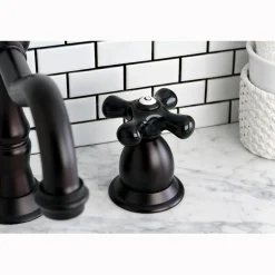 Kingston Brass Heritage Onyx Widespread Solid Brass Lavatory Faucet with Black Porcelain Cross Handle