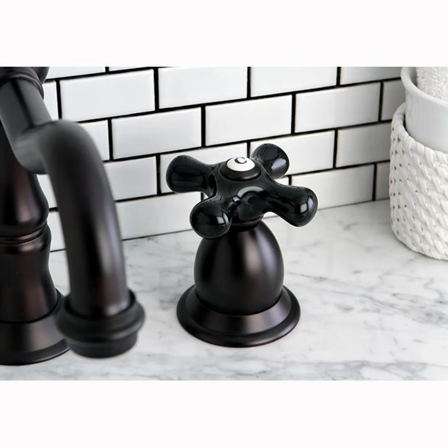 Kingston Brass Heritage Onyx Widespread Solid Brass Lavatory Faucet with Black Porcelain Cross Handle
