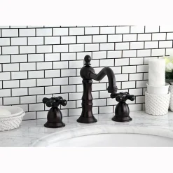 Kingston Brass Heritage Onyx Widespread Solid Brass Lavatory Faucet with Black Porcelain Cross Handle
