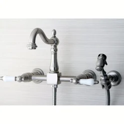 Kingston Brass Heritage Wall Mount 8-Inch Centerset Kitchen Faucet with Brass Sprayer