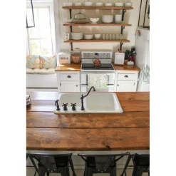 Kingston Brass Heritage Widespread Kitchen Faucet with Brass Sprayer