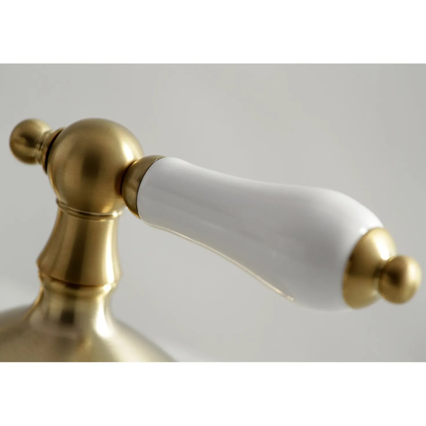 Kingston Brass Heritage 8" Widespread Deck Mount Bathroom Faucet