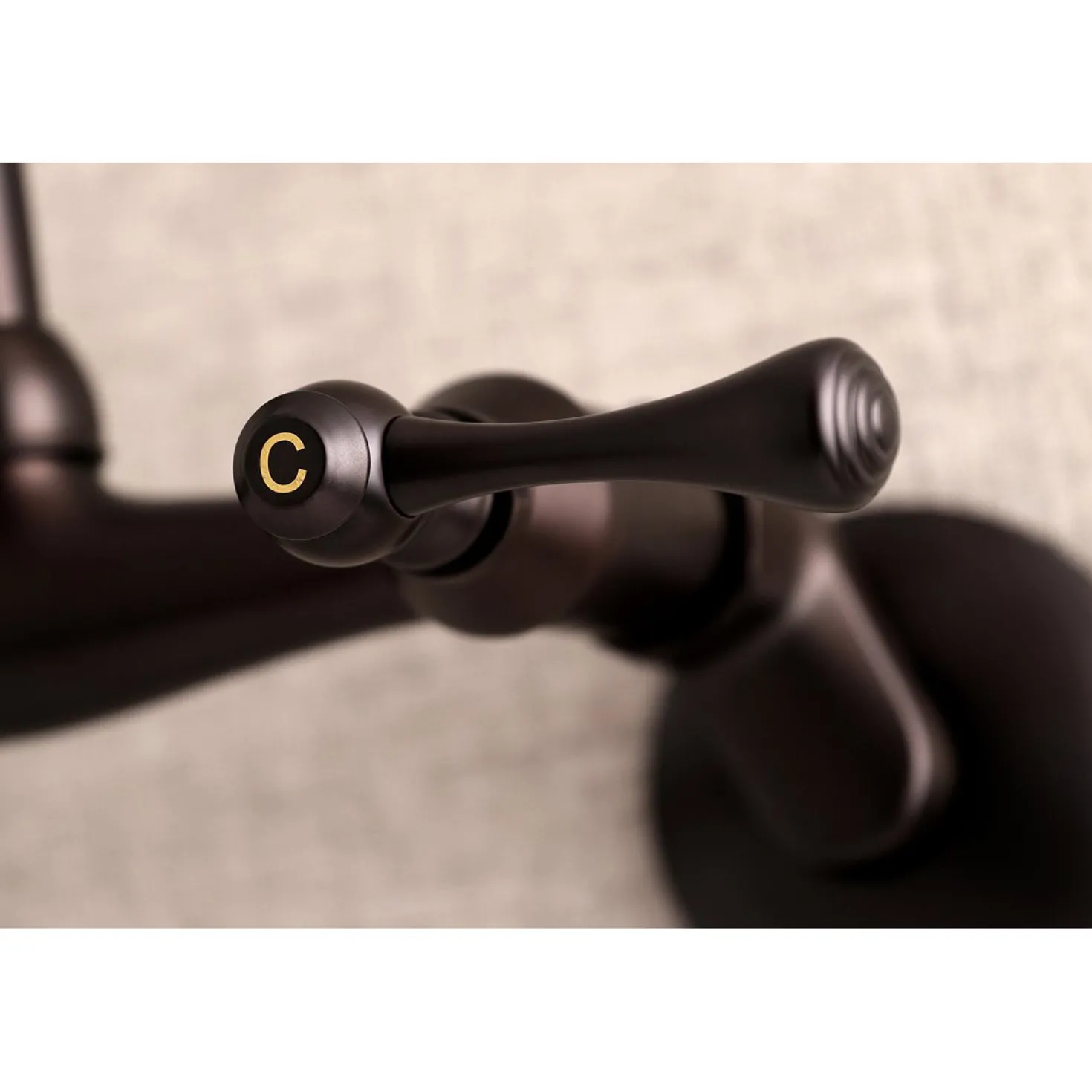 Kingston Brass 6-Inch Adjustable Center Wall Mount Laundry Faucet
