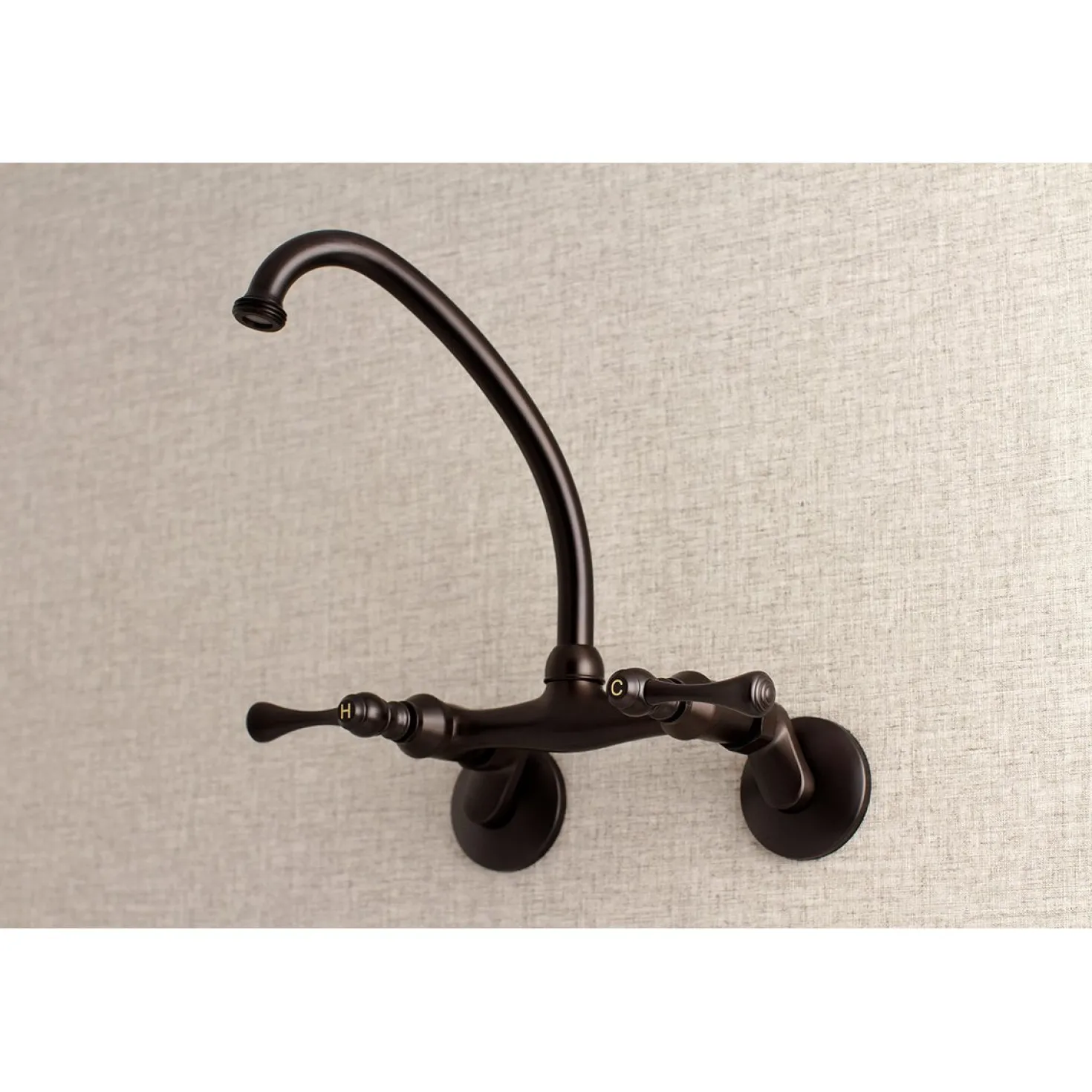 Kingston Brass 6-Inch Adjustable Center Wall Mount Laundry Faucet