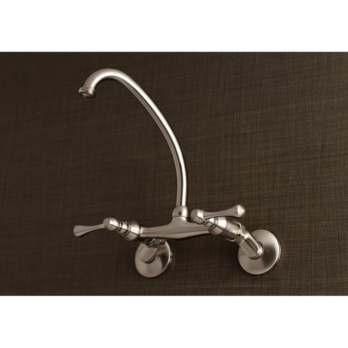 Kingston Brass 6-Inch Adjustable Center Wall Mount Laundry Faucet