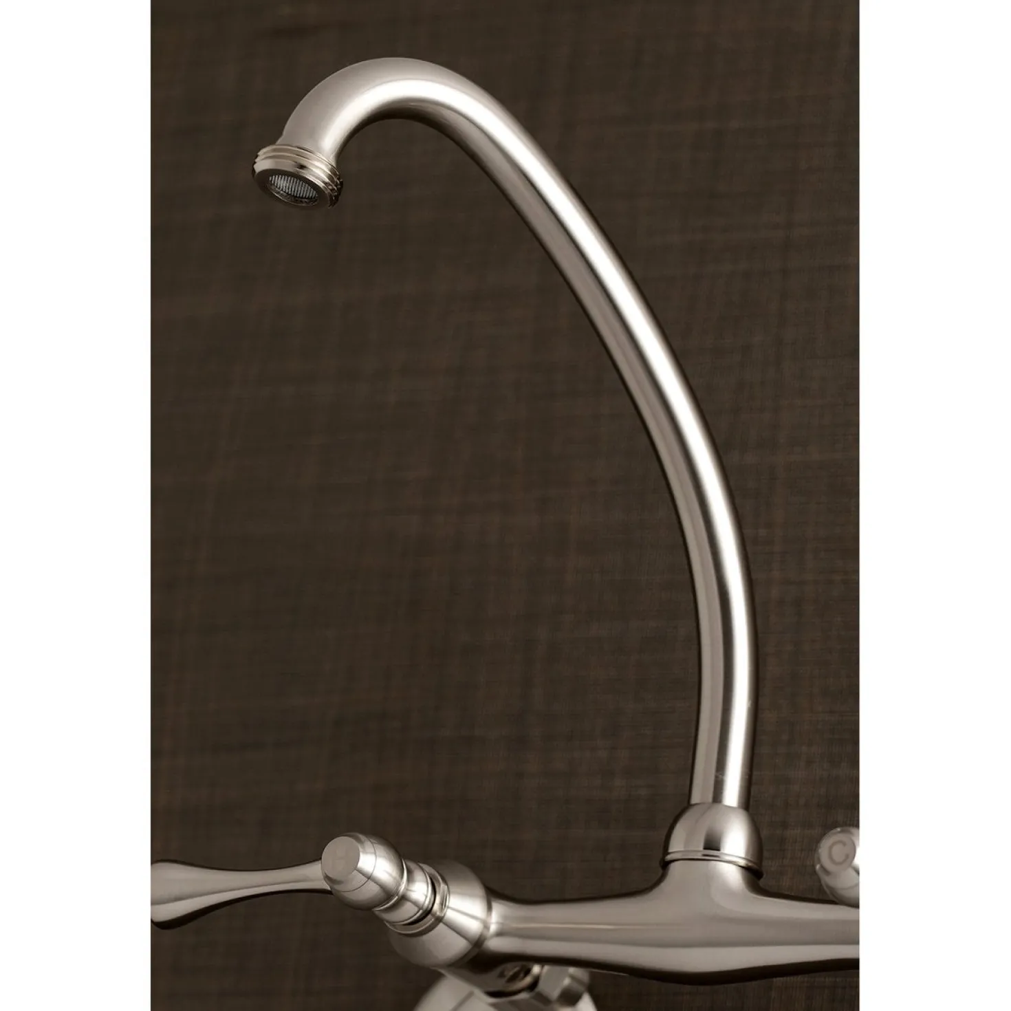 Kingston Brass 6-Inch Adjustable Center Wall Mount Laundry Faucet