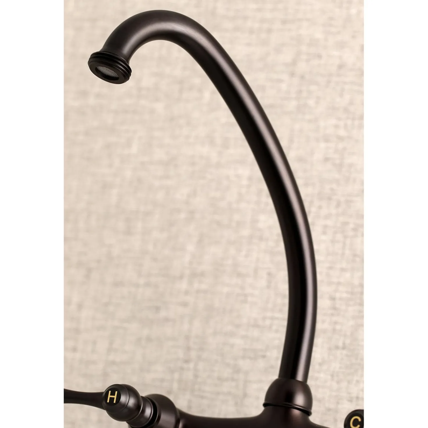Kingston Brass 6-Inch Adjustable Center Wall Mount Laundry Faucet