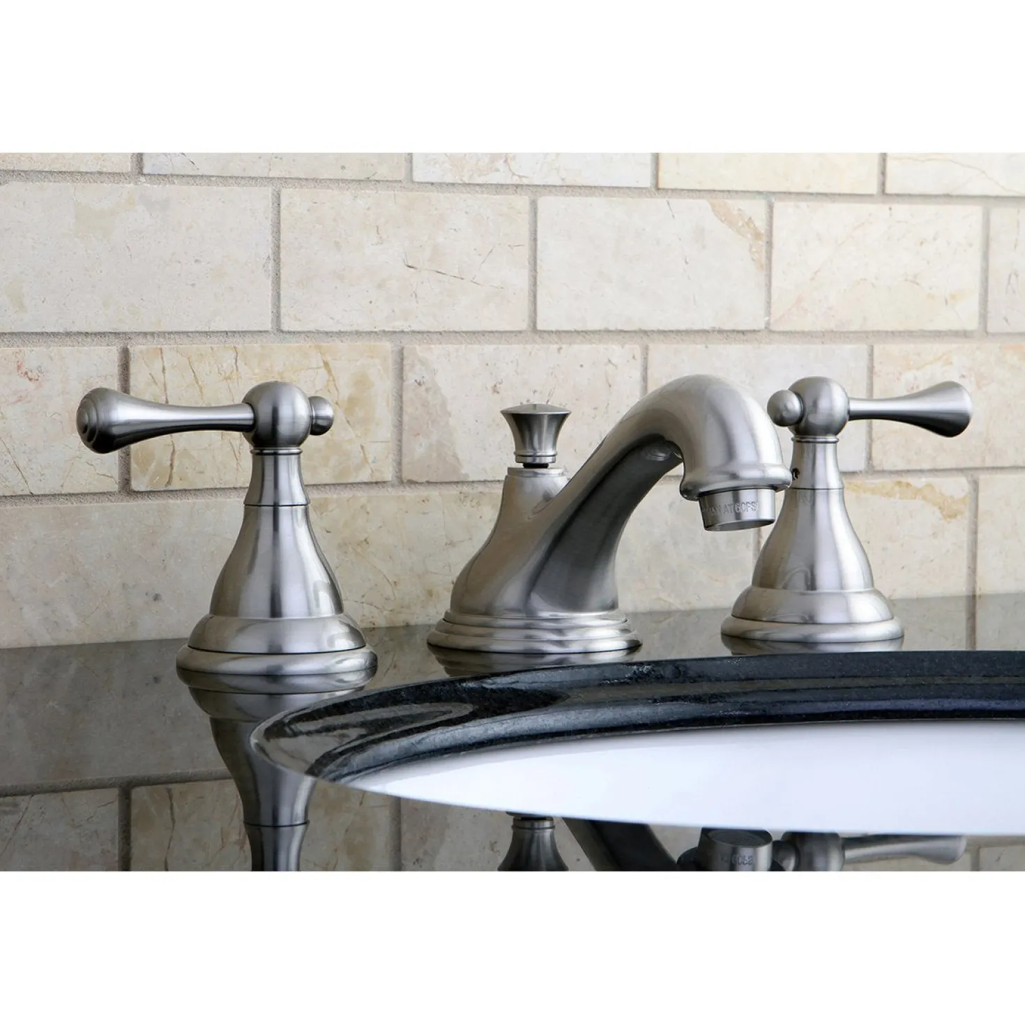 Kingston Brass 8-Inch Widespread Three-Hole Bathroom Faucet with Brass Pop-Up