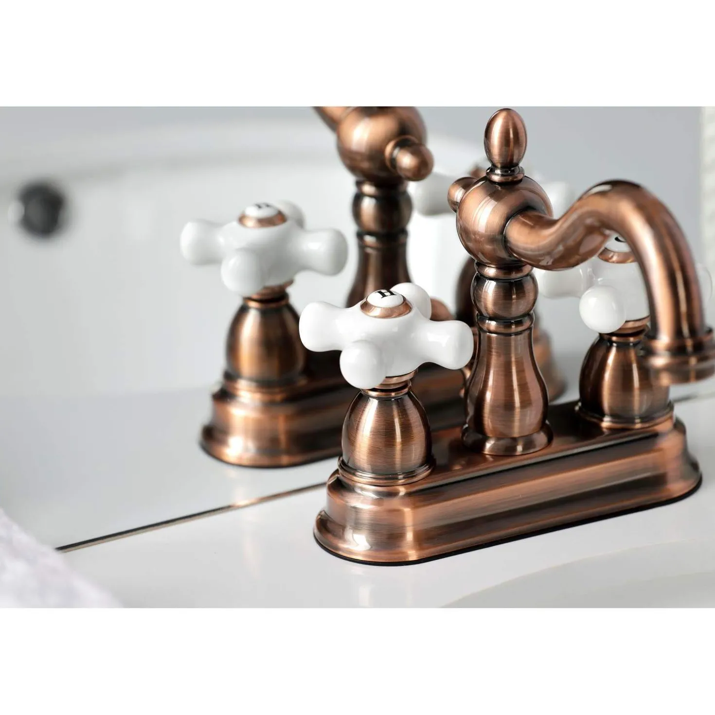 Kingston Brass KB160PXAC Heritage 4 in. Centerset Bathroom Faucet, Antique Copper