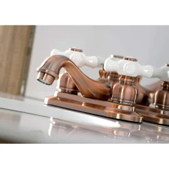 Kingston Brass KB606PX Restoration 4 in. Centerset Bathroom Faucet, Antique Copper