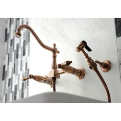 Kingston Brass KS124ALBSAC Heritage Two-Handle Wall Mount Bridge Kitchen Faucet with Brass Sprayer, Antique Copper