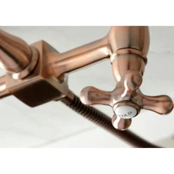 Kingston Brass KS124AXBSAC Heritage Two-Handle Wall Mount Bridge Kitchen Faucet with Brass Sprayer, Antique Copper